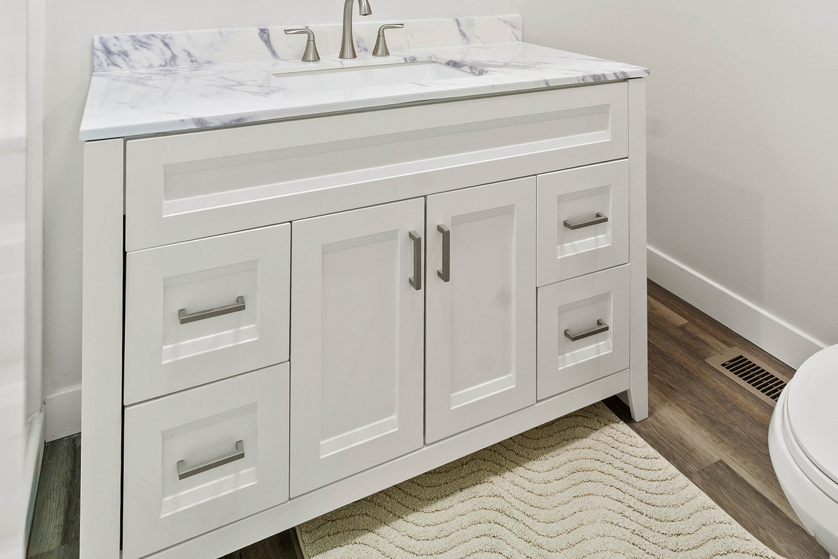 The Waterbury Way - Primary Bath Vanity with hair dryer, make-up mirror and make-up remover wipes