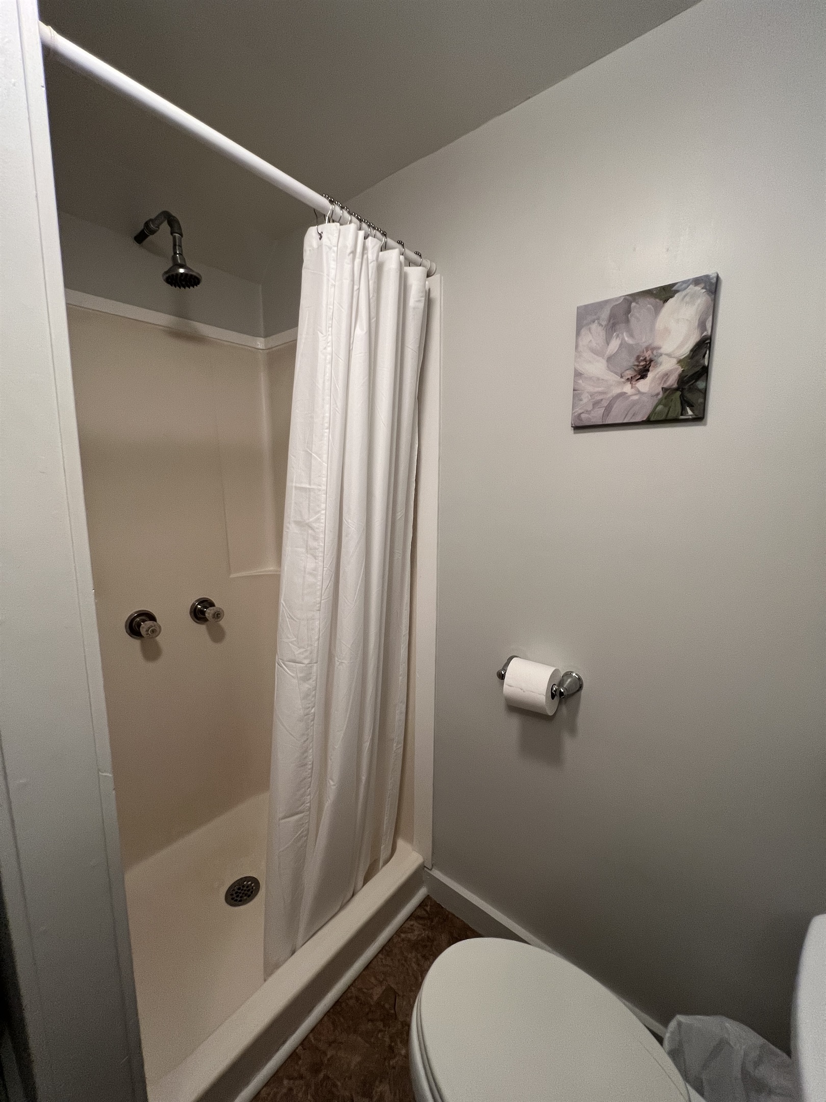 Shower bathroom located in the main area.