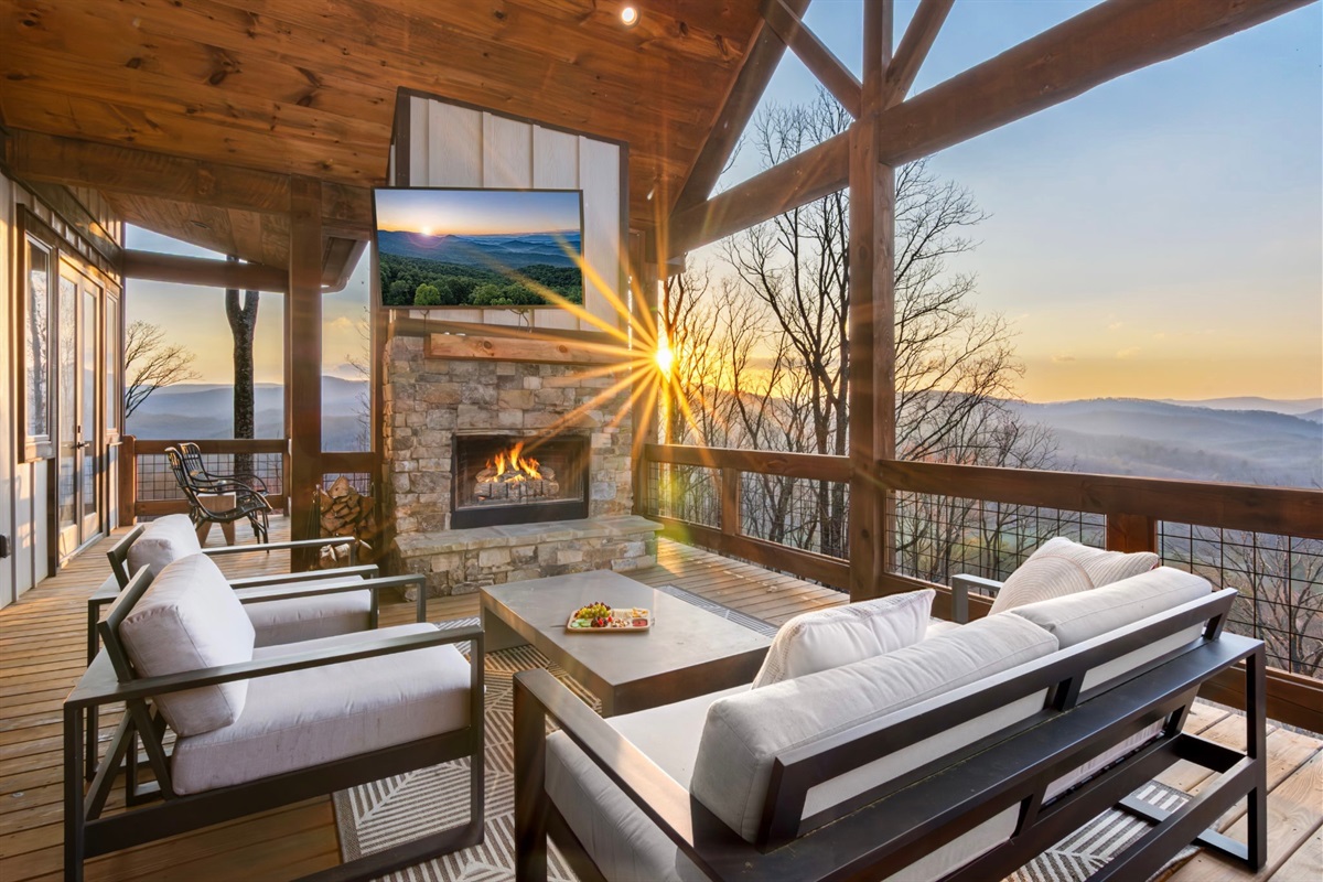 Upstairs features an open-concept living room, dining area, and kitchen, with an airy feel and abundant light