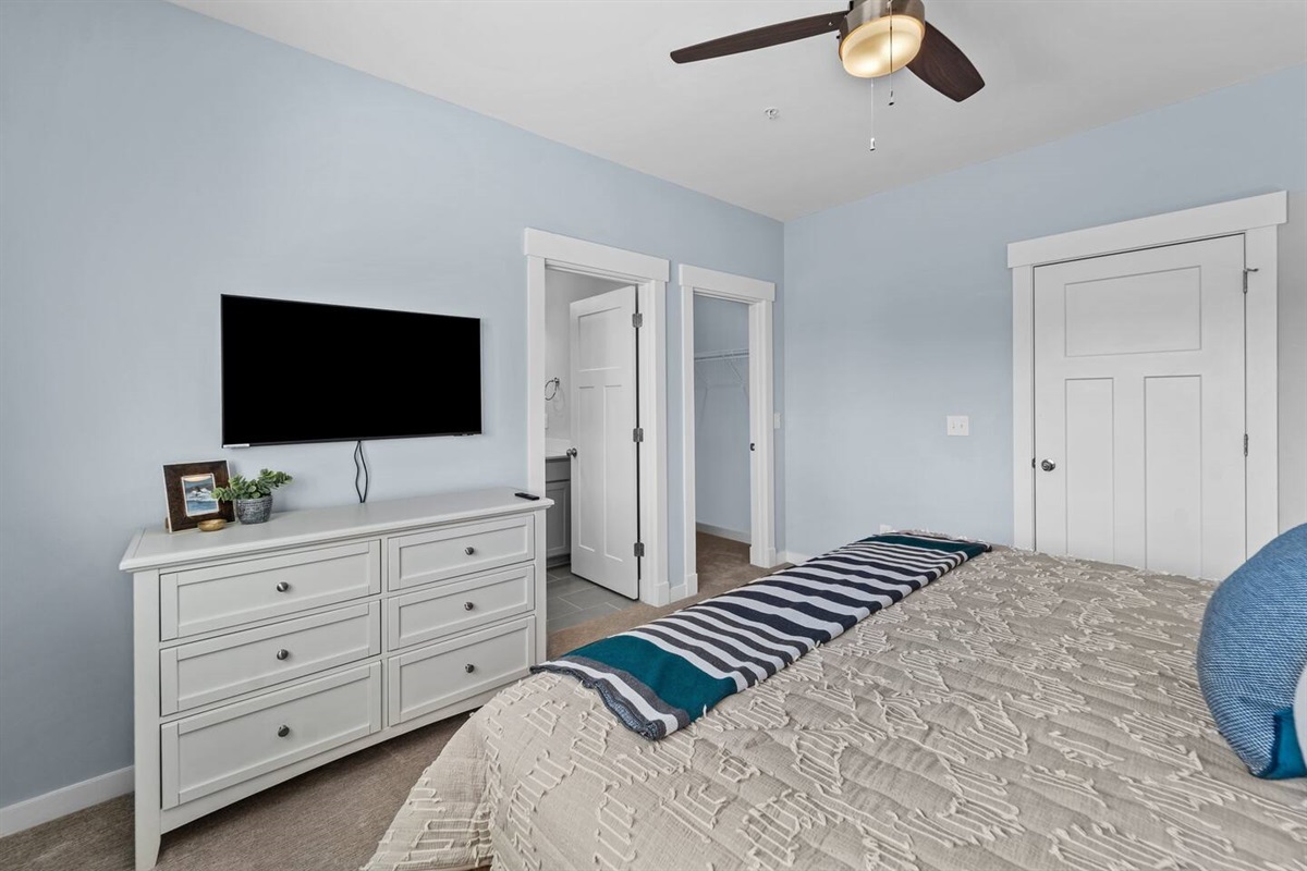 King Bed with Ensuite bath, TV, and walk-in closet