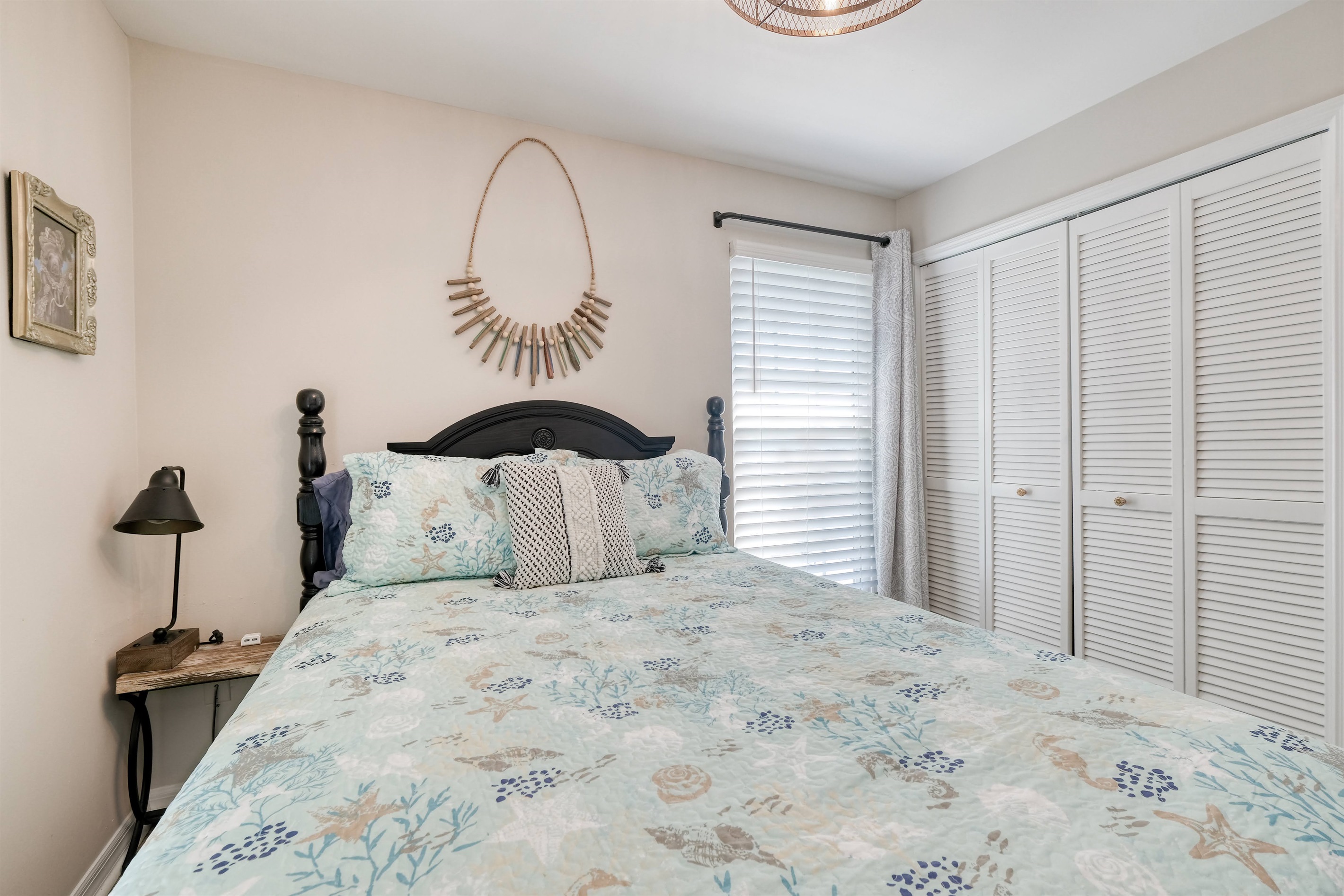 Master bedroom has a queen bed