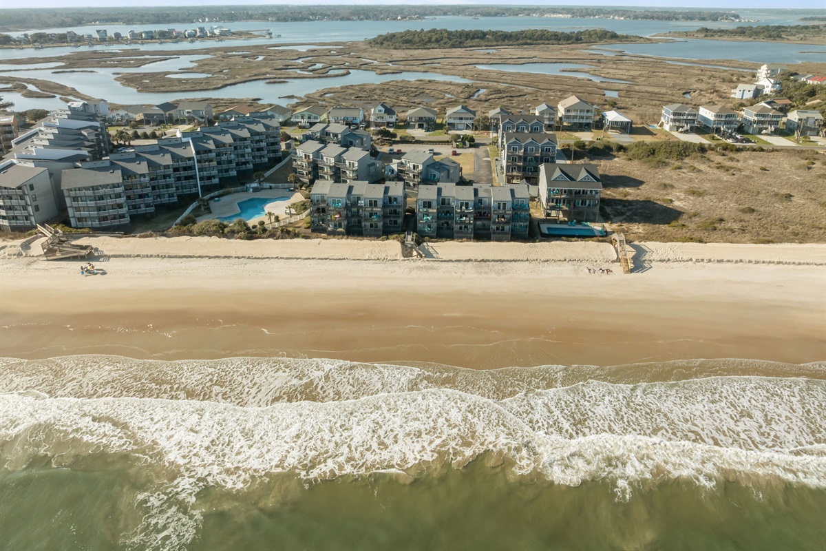 Perfectly placed between the Atlantic Ocean and the peaceful sound, giving you the best of both water views just steps from the sand