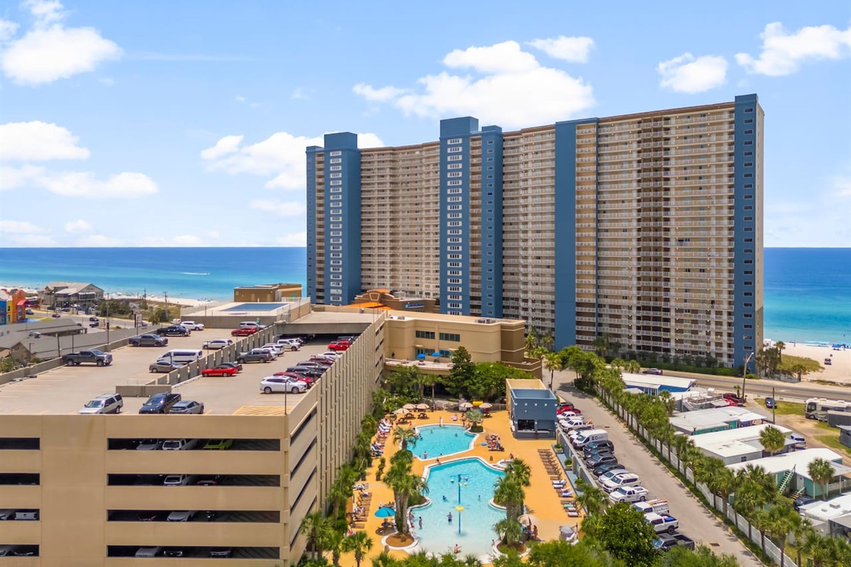 Enjoy two resort-style pools, a relaxing hot tub, a fun splash area, and a shallow kids' pool—perfect for family-friendly fun just steps from the sand!