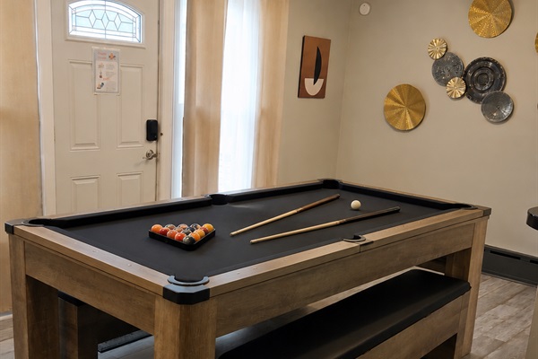 Surprise! Our dining table easily converts to a pool table for extra fun