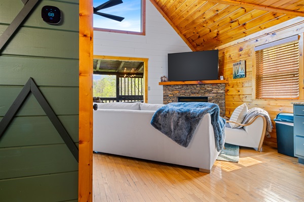 Enter into the open concept living - dining- kitchen space