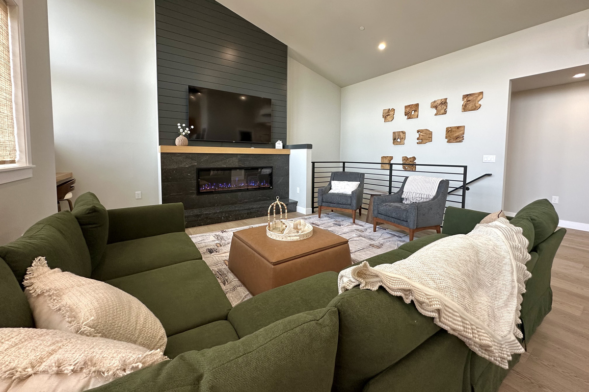 Wrap a throw over your lap and disappear into the sectional — this corner of Side A stays quiet even when the rest of the house doesn't.