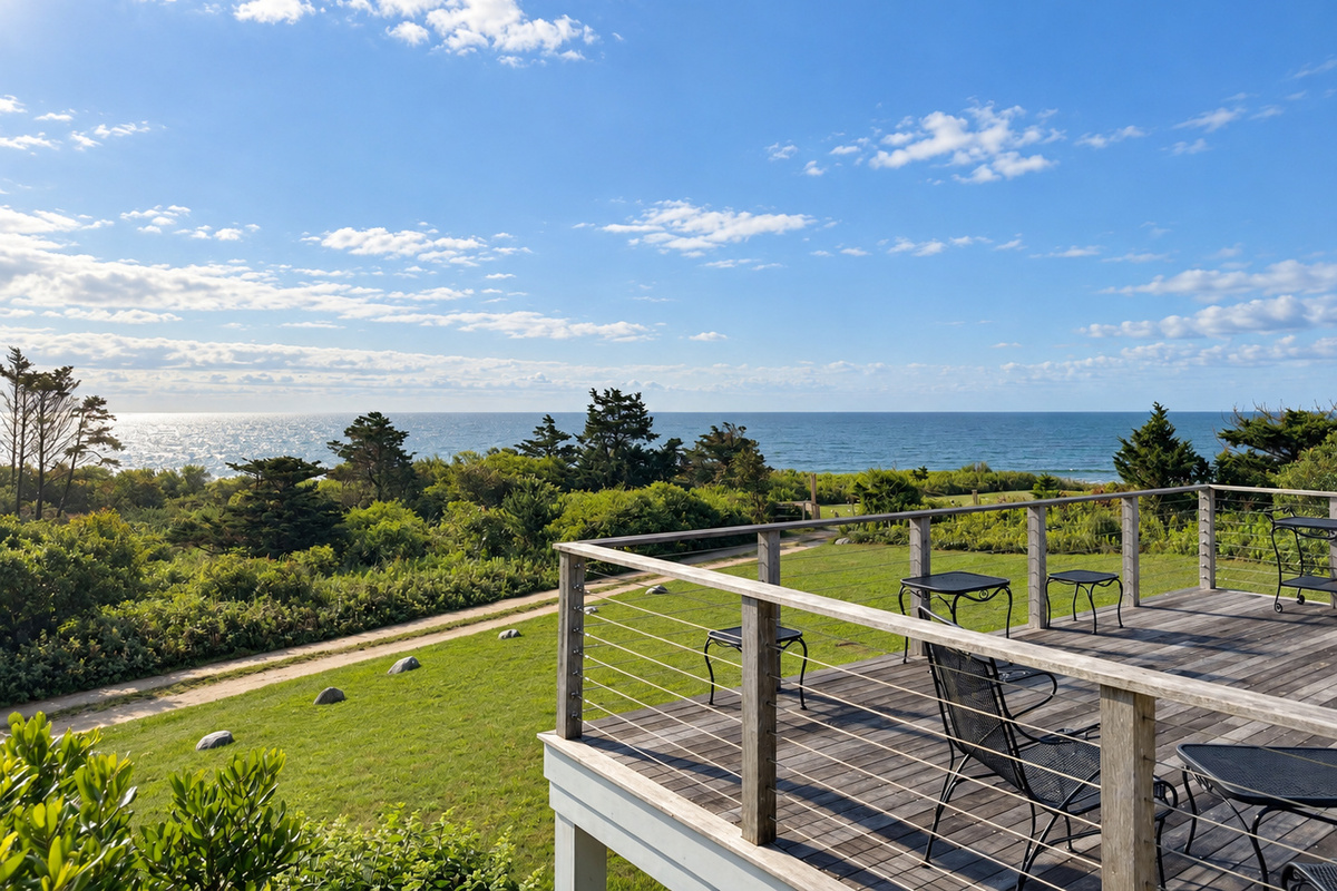 Deck with seating and water views