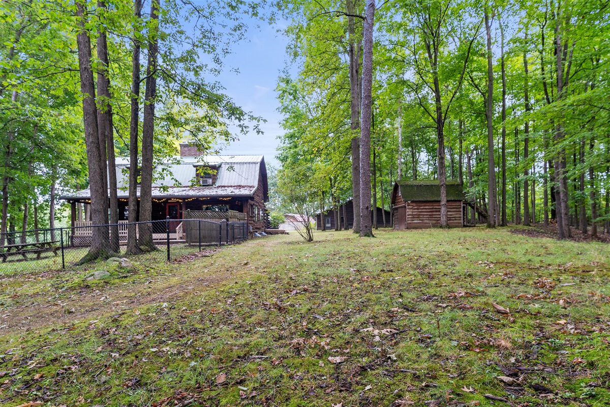 Stroll through your very own wooded paradise with towering trees and serene forest views.