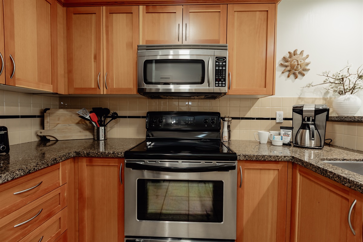 Unit A Modern Fully stocked Kitchen.
