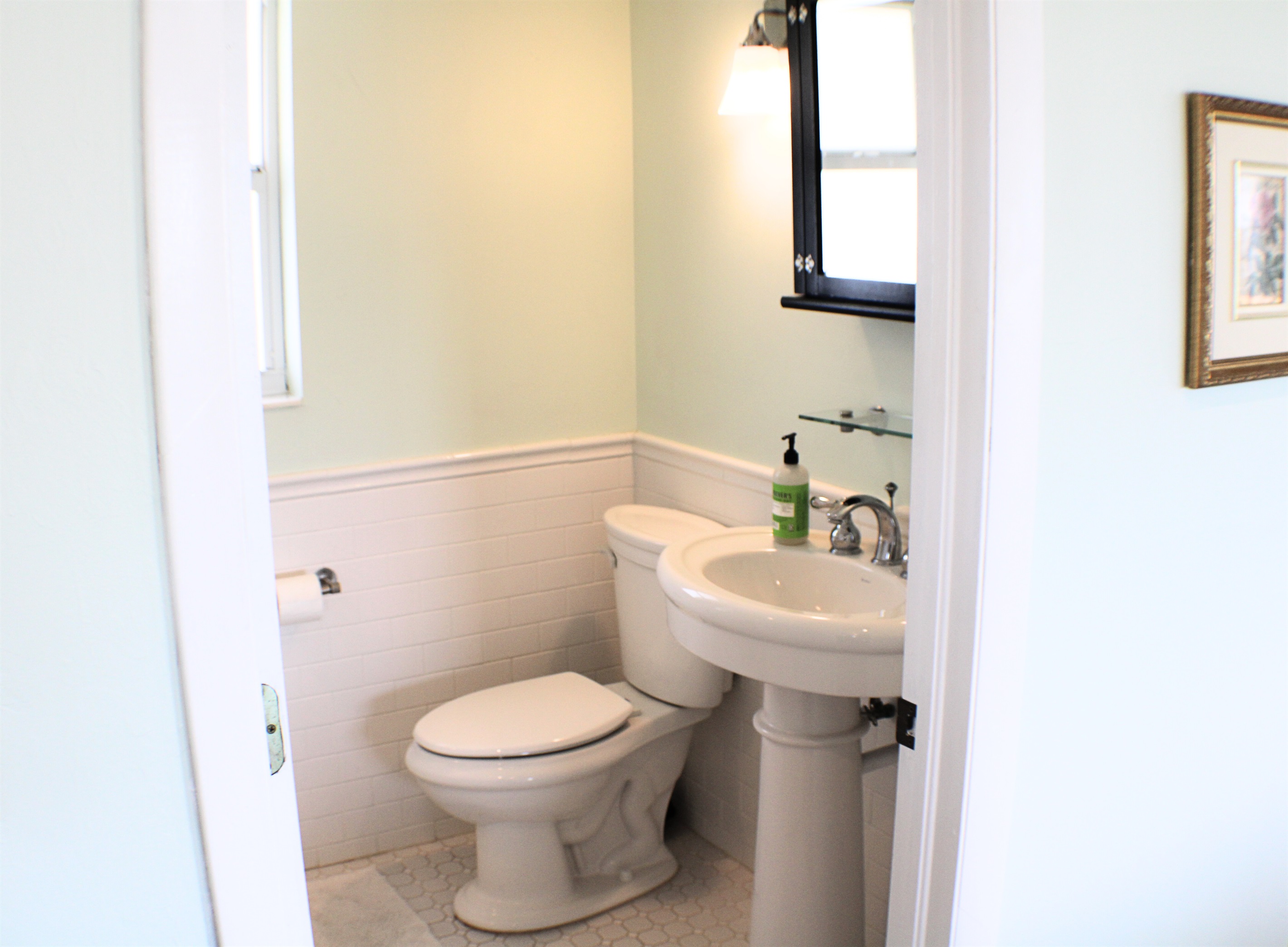 A full bathroom is located on the living room level
