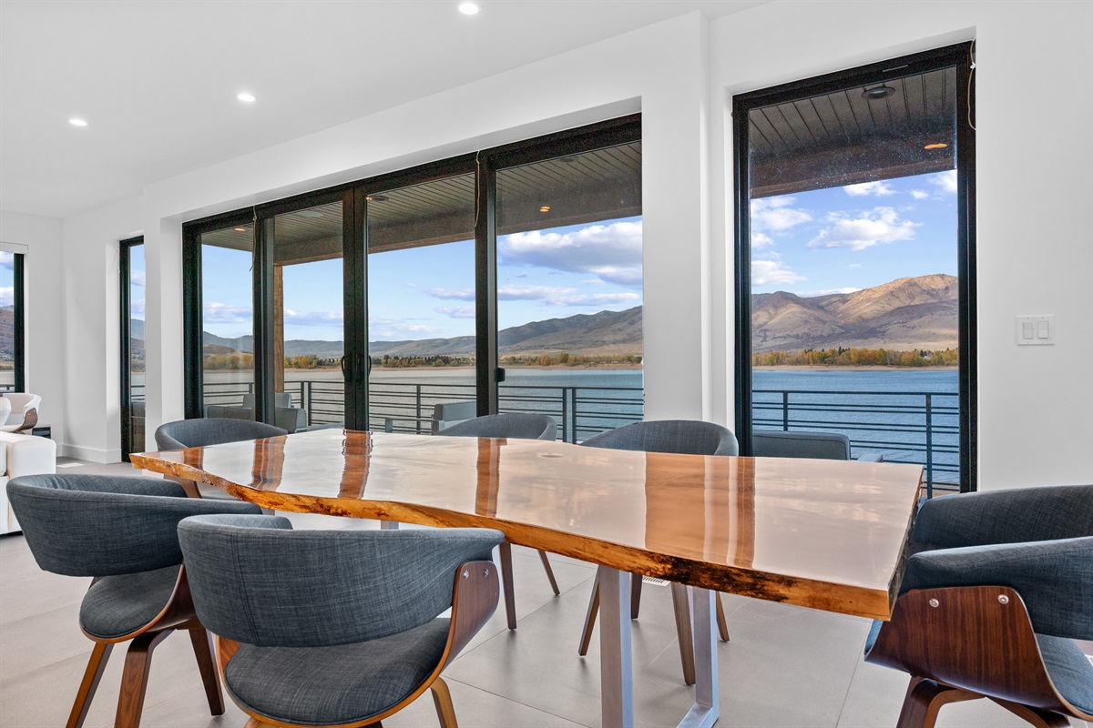Dining area with lake and mountain views overlooking Pineview Reservoir.