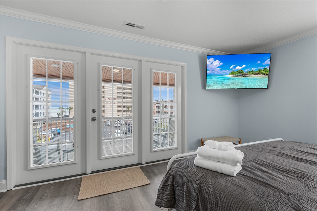 Ocean views from the king bed in the Primary Suite on the upper level