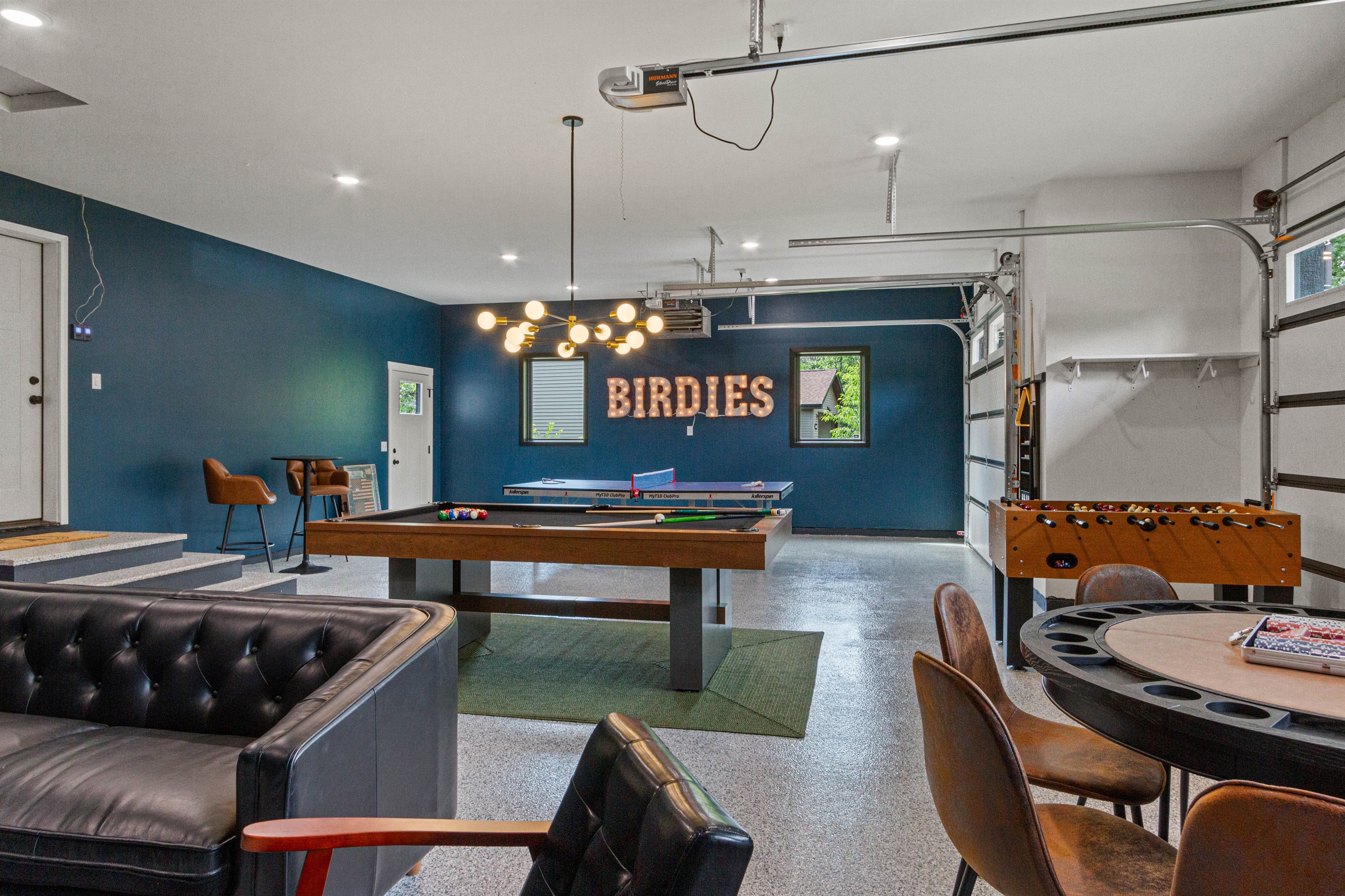Unwind with games, cold drinks, and nonstop laughs in the ultimate hangout garage