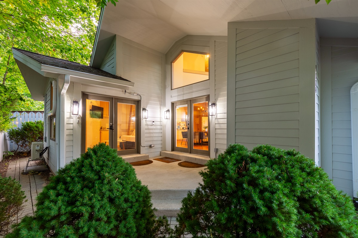 Main entry door on the right and entry to the apartment on the left