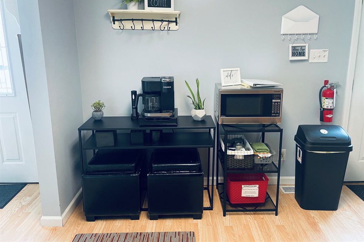 Coffee bar with Keurig and brew pot.