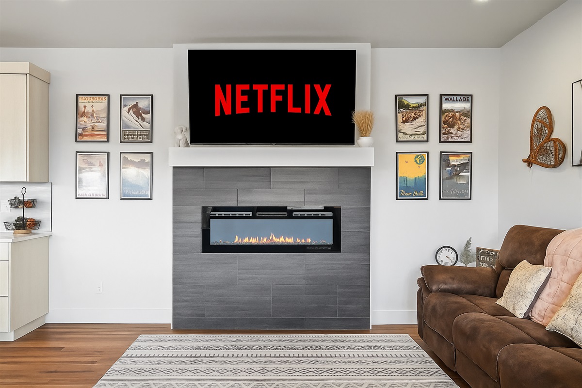 Relax in style by the LED fireplace and stream your favorite shows on Netflix