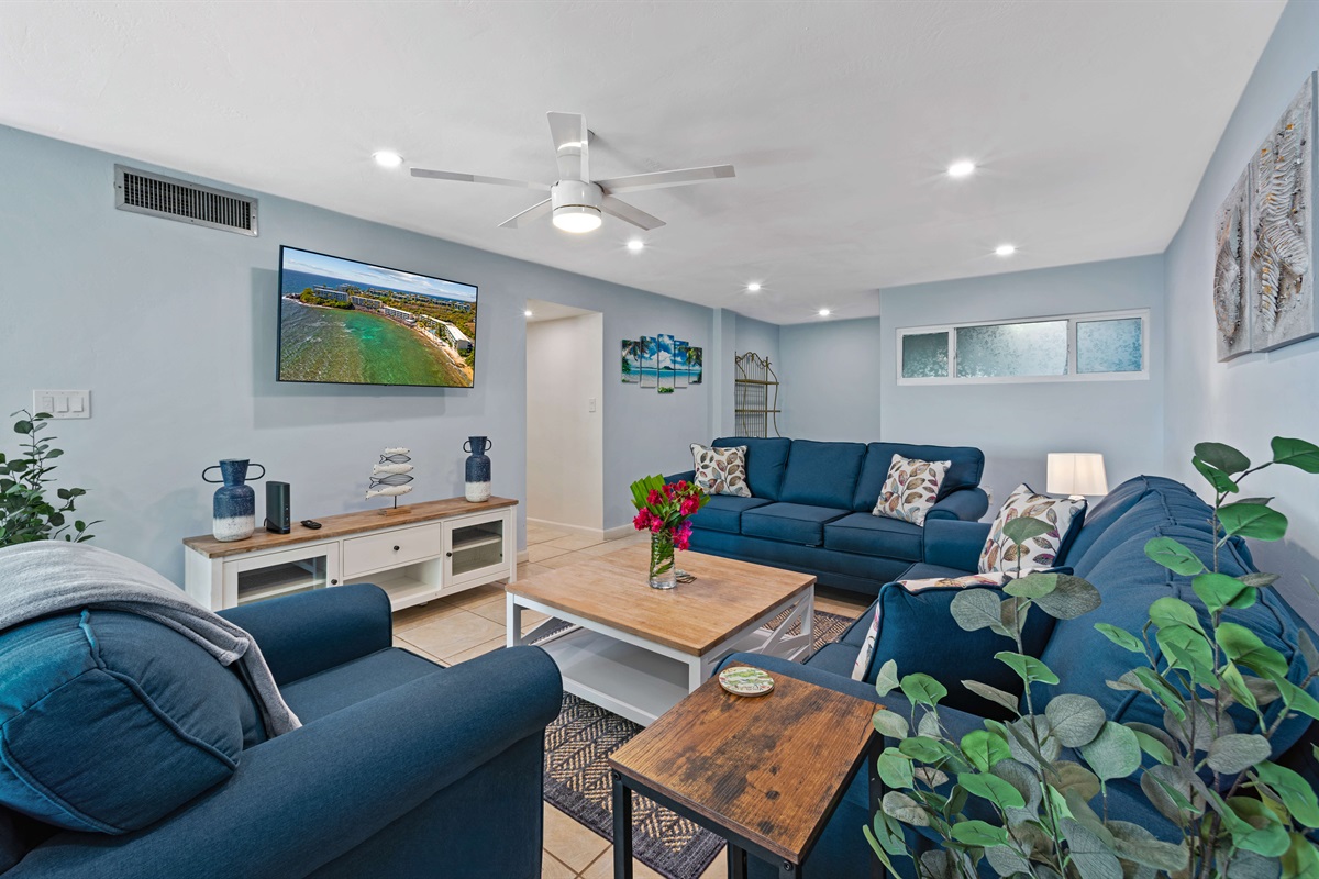 Enjoy the large living room with Smart TV and plenty of seating for movie nights