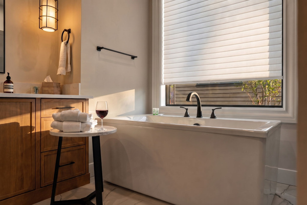 Relax in the soaking tub with a nice glass of wine