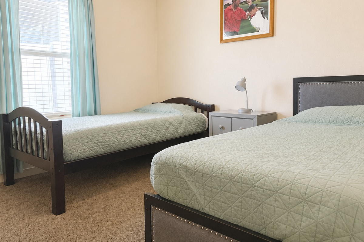 Two adults or kids can share this third bedroom and get much needed zzz's!