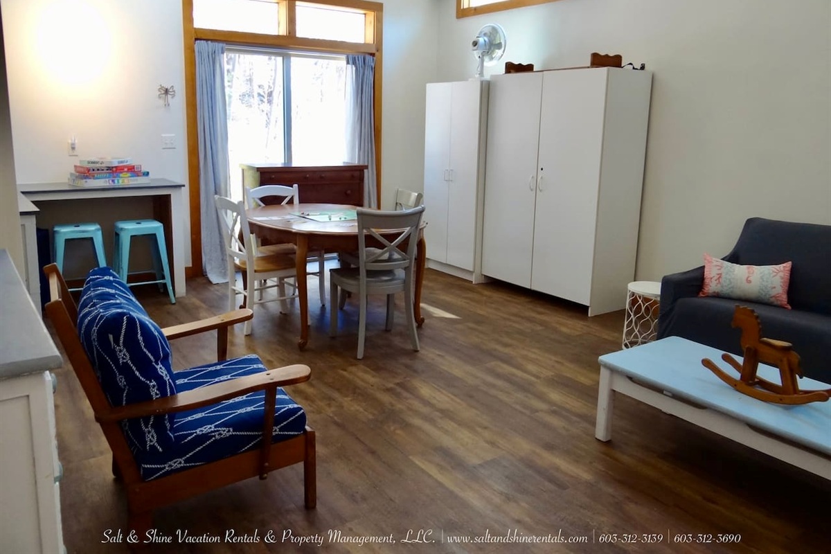 Other half of entertainment area...with access to the sliding door outside