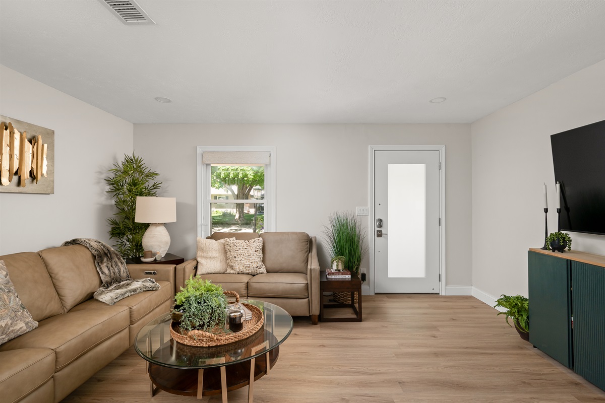 Step through the front door into a warm and inviting living space designed for relaxing after a day exploring Indianapolis and Brownsburg.