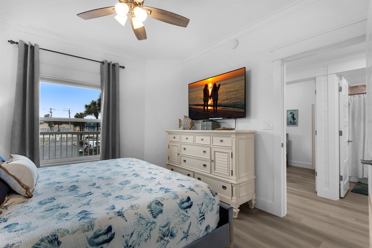 Primary bedroom with TV