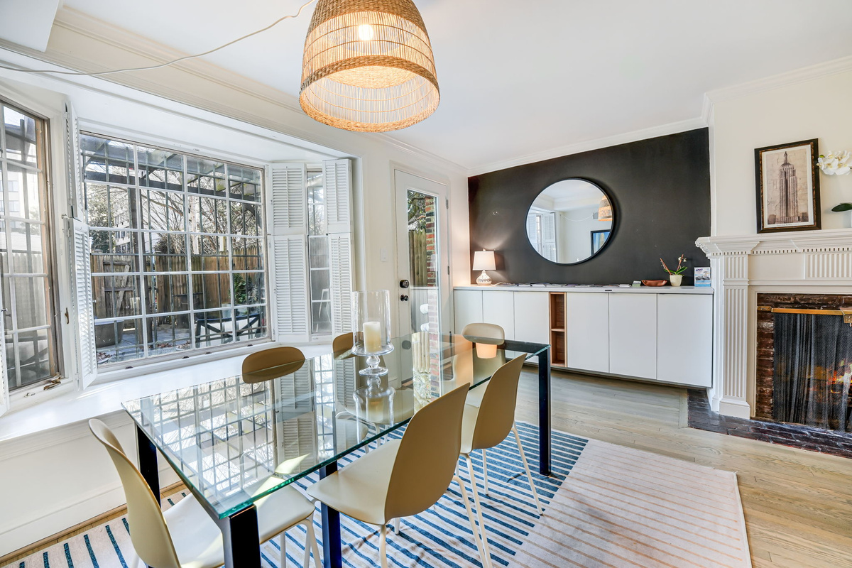 Dining Room: Seating for 6, Desk, Rear Door to Patio, Free Parking, EV Charging.