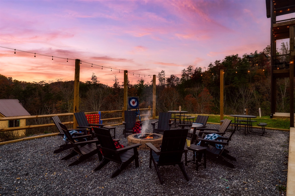 Fire Pit in backyard with picnic tables & views