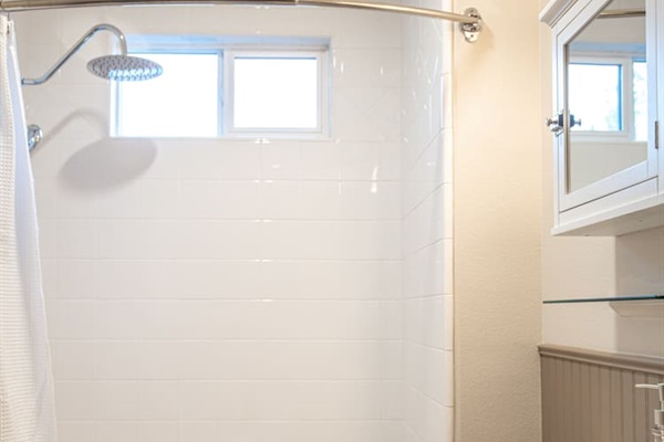 Recharge and relax in our inviting guest bathroom.