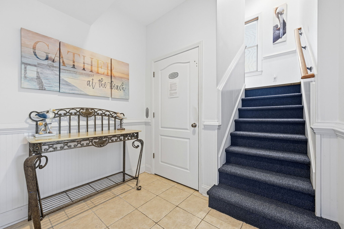 Simple and welcoming space connecting every level of the home with easy flow throughout