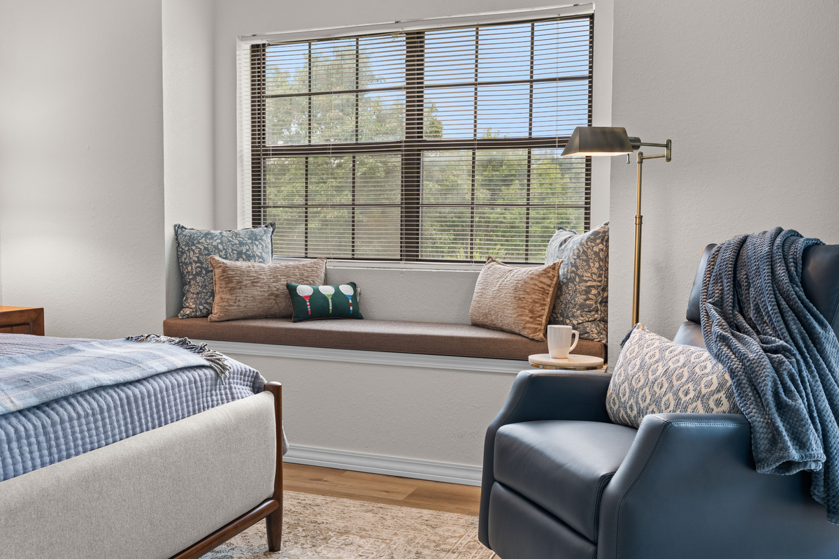 A built-in window seat and recliner create a quiet place to read or unwind.