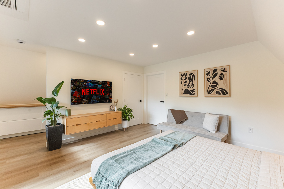 Netflix in bed, forest outside