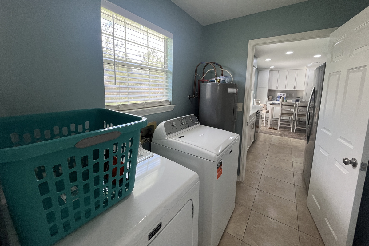 New washer and dryer for our guests. Laundry baskets provided. Iron and ironing board, vacuum and cleaning essentials.