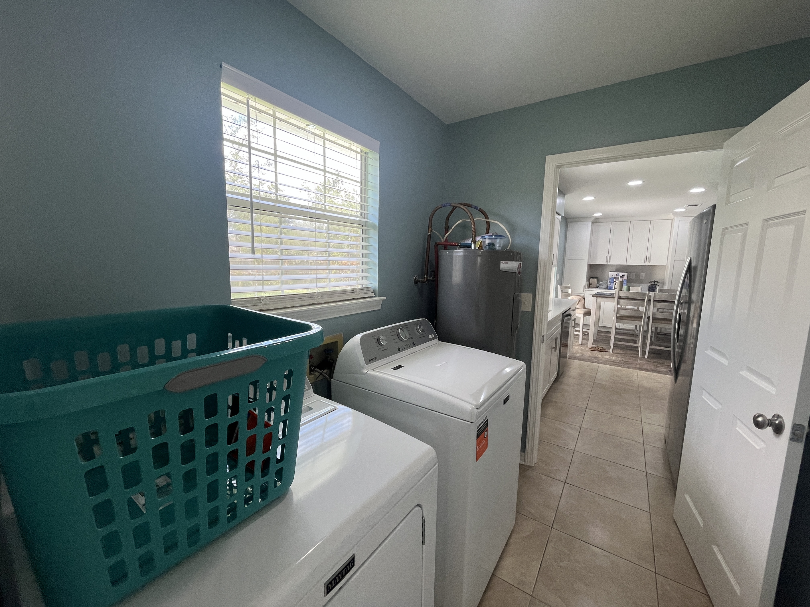 New washer and dryer for our guests. Laundry baskets provided. Iron and ironing board, vacuum and cleaning essentials.
