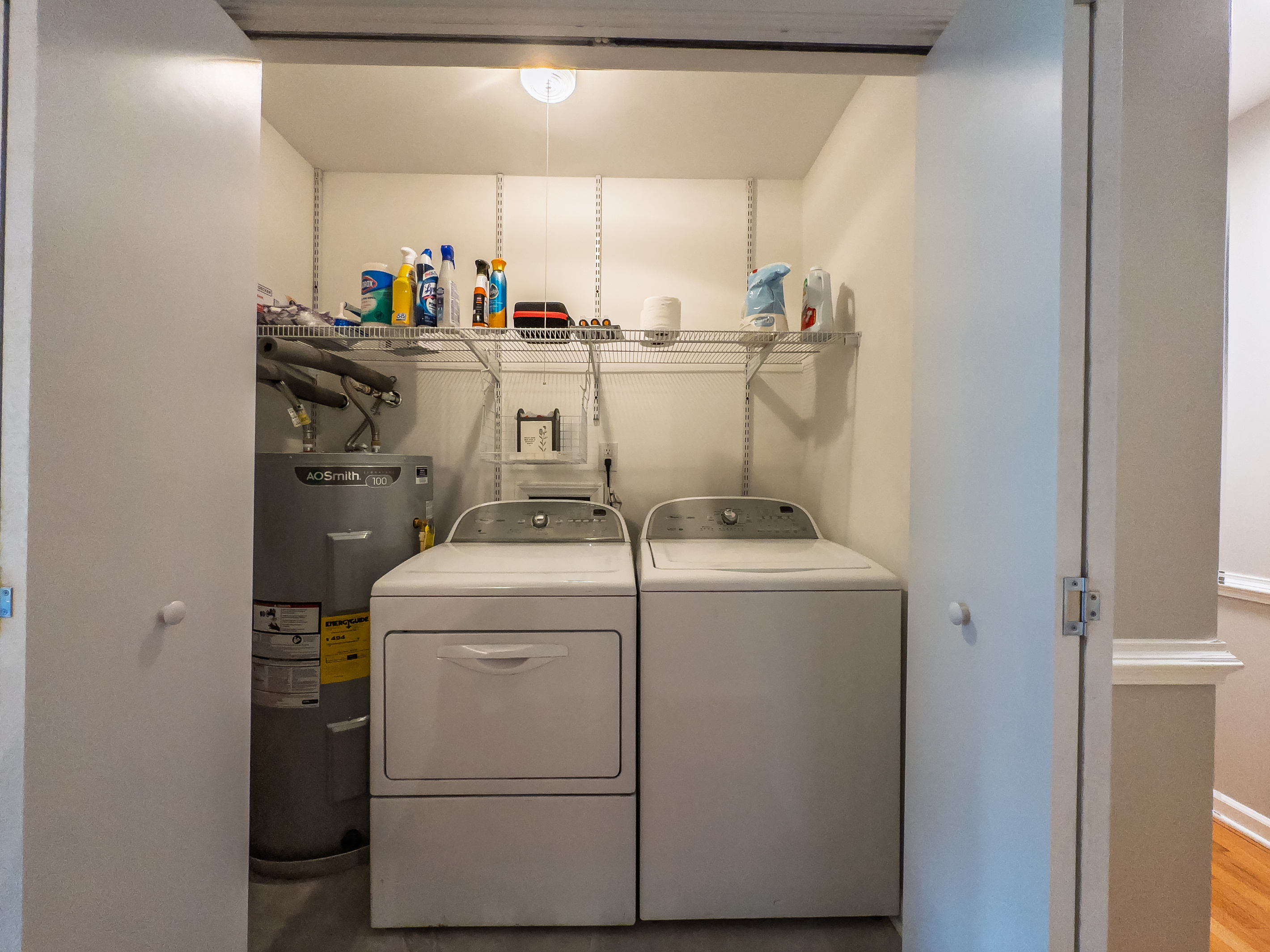 Laundry - Washer, dryer, iron, ironing board, starter and emergency supplies.