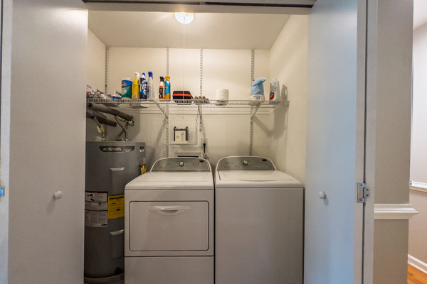 Laundry - Washer, dryer, iron, ironing board, starter and emergency supplies.