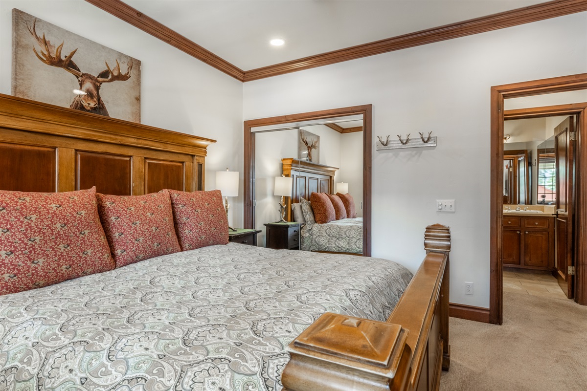 Thoughtful furnishings and close proximity to the hall bath make the guest bedroom a perfect retreat for couples or additional adult guests.