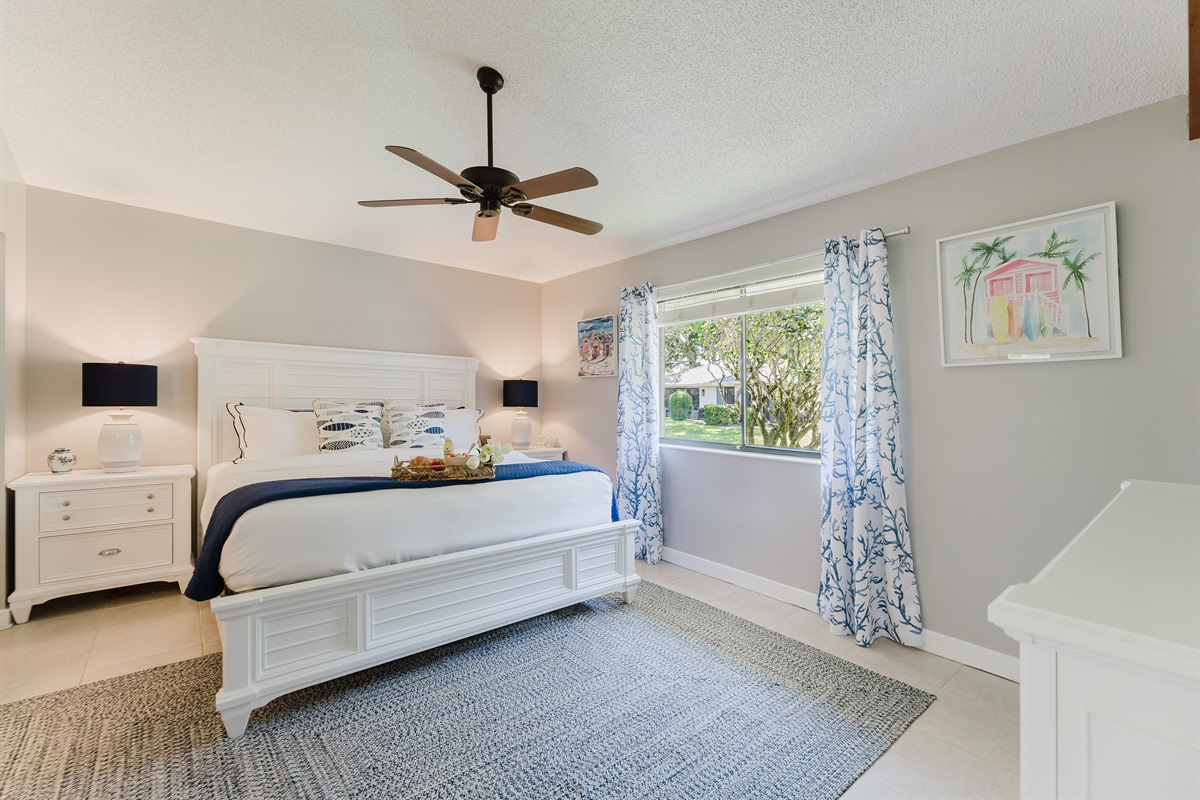Spacious primary king suite featuring a walk-in closet and a beautifully updated ensuite bathroom—designed for comfort, relaxation, and a true vacation retreat feel
