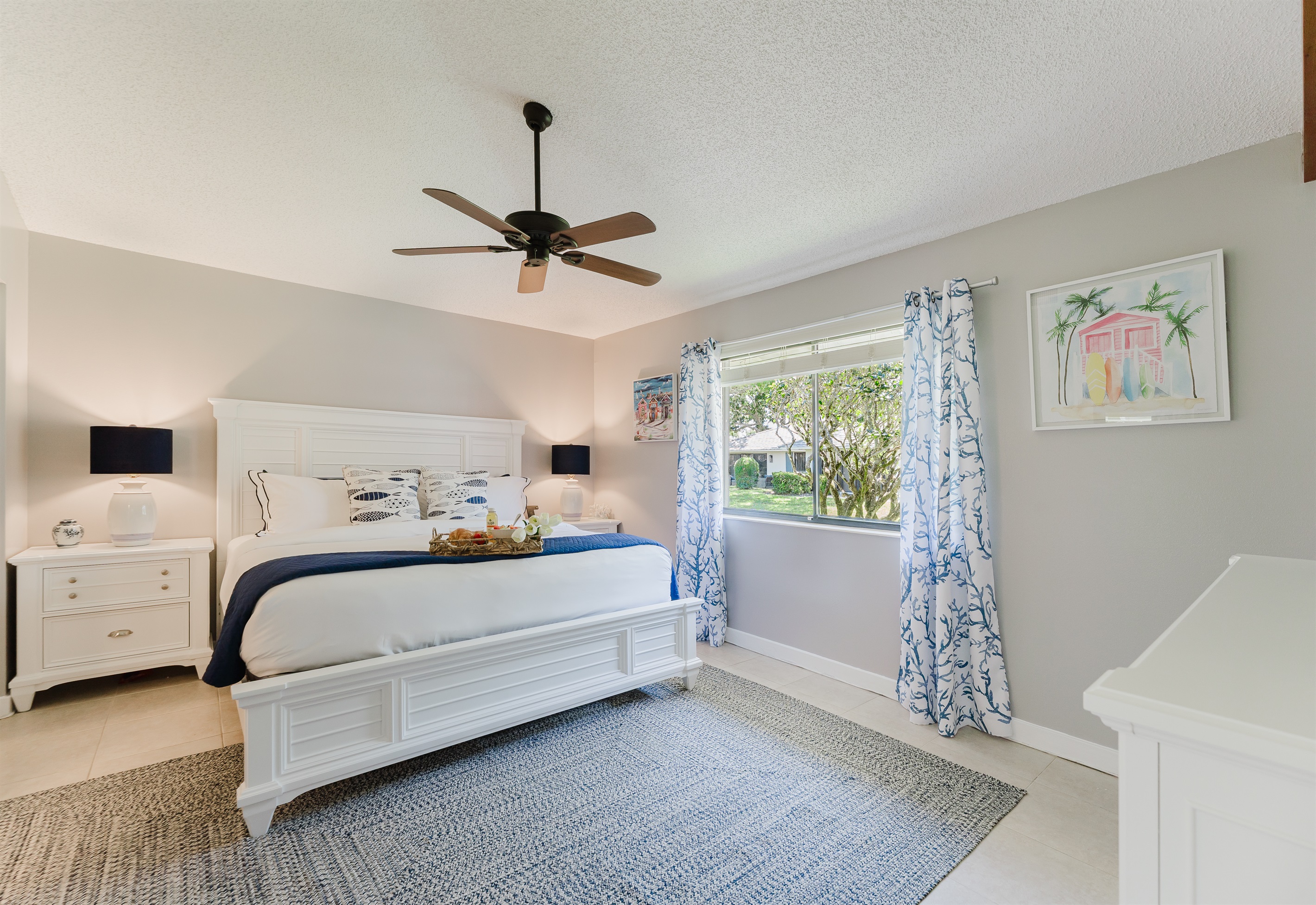 Spacious primary king suite featuring a walk-in closet and a beautifully updated ensuite bathroom—designed for comfort, relaxation, and a true vacation retreat feel

