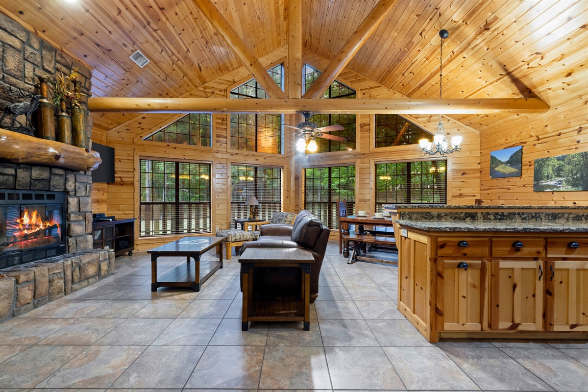 Open living space with tall ceilings and woodsy character.