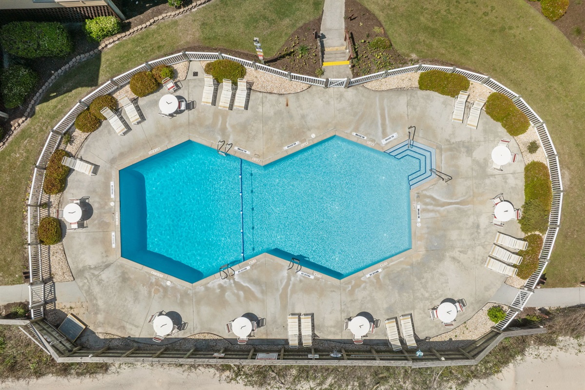 Resort-style seasonal pool with plenty of lounge space