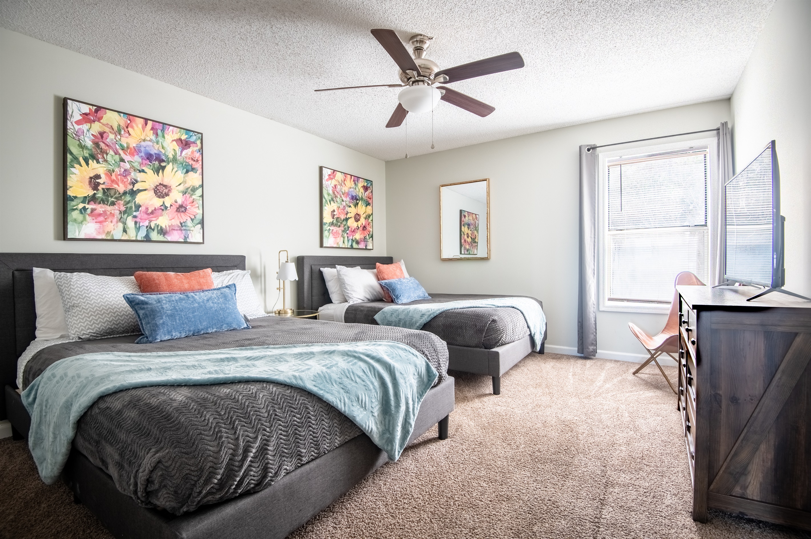 This double queen bedroom is thoughtfully designed with gentle colors and includes a smart TV with all your favorite streaming apps for your comfort and viewing pleasure!