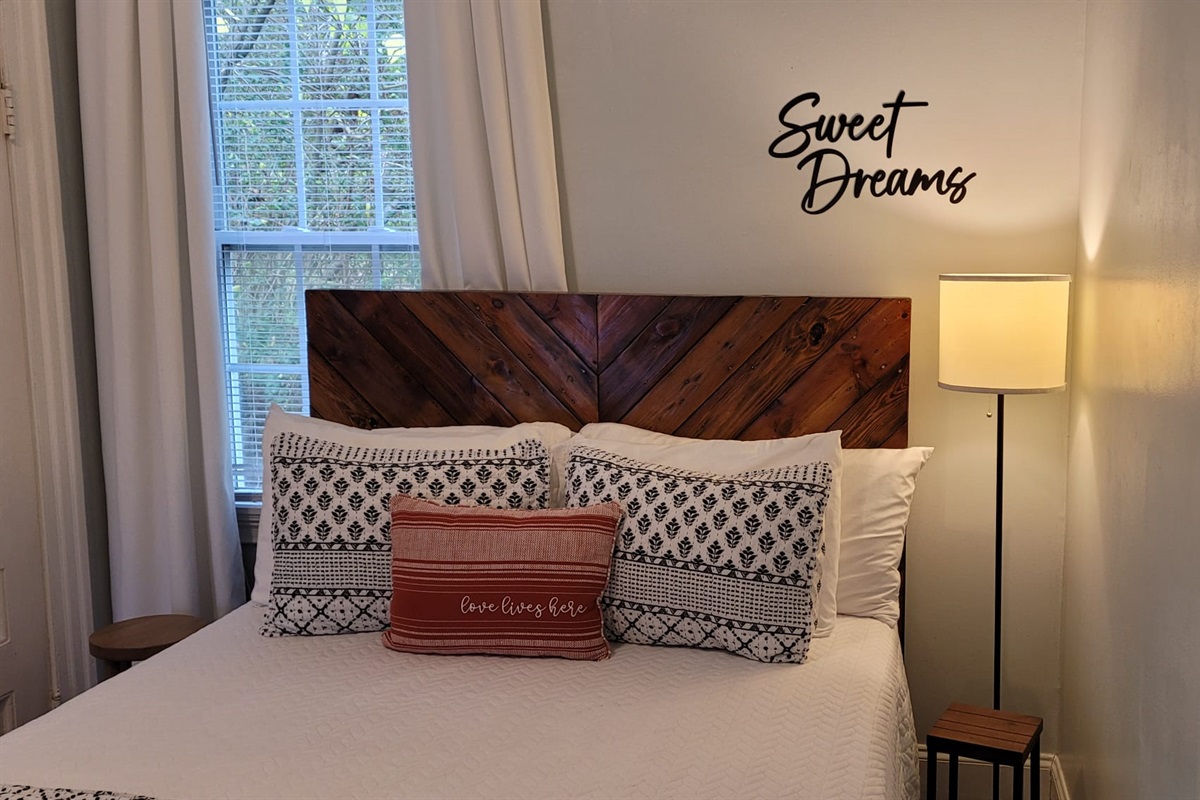 Queen bed with a custom headboard