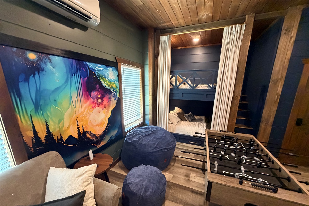 Psychedelic mural makes this game room even more fun