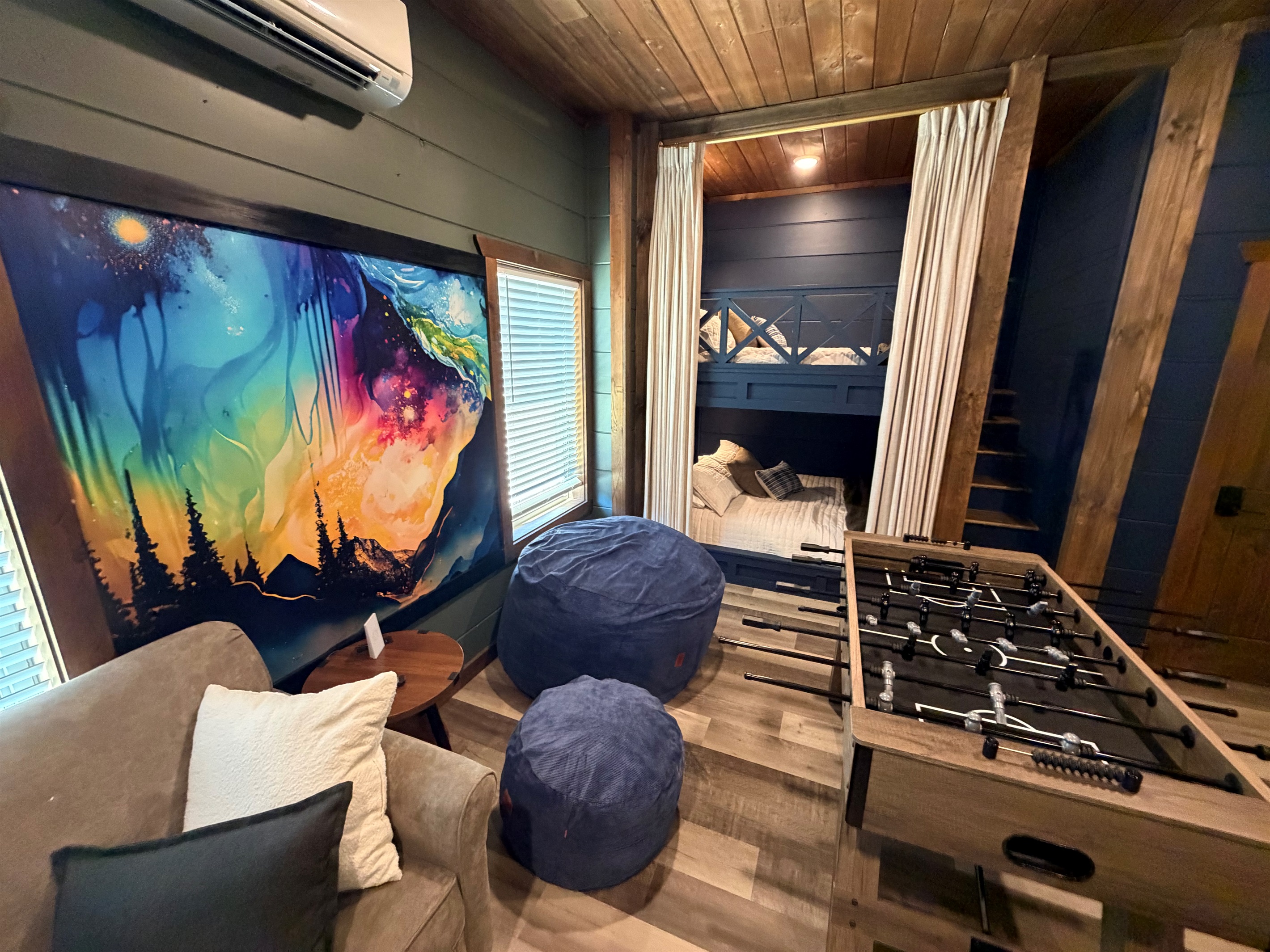 Psychedelic mural makes this game room even more fun