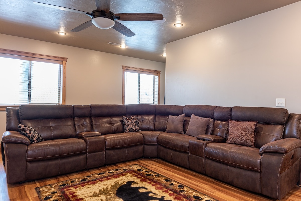 Plenty of seating in the basement for family movie nights.