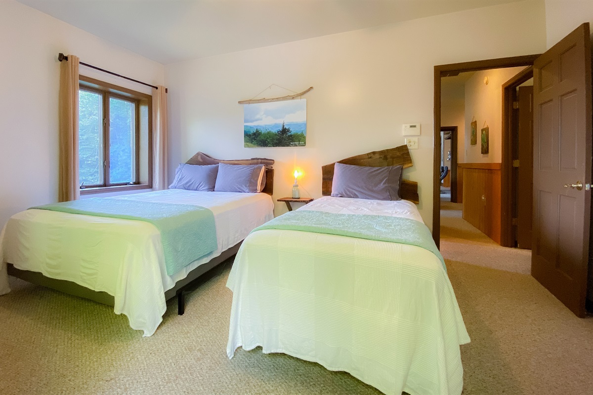 Our Waterrock Knob themed bedroom overlooking one of the highest peaks in the Smokies. You can visit for a most excellent sunrise or sunset experience!