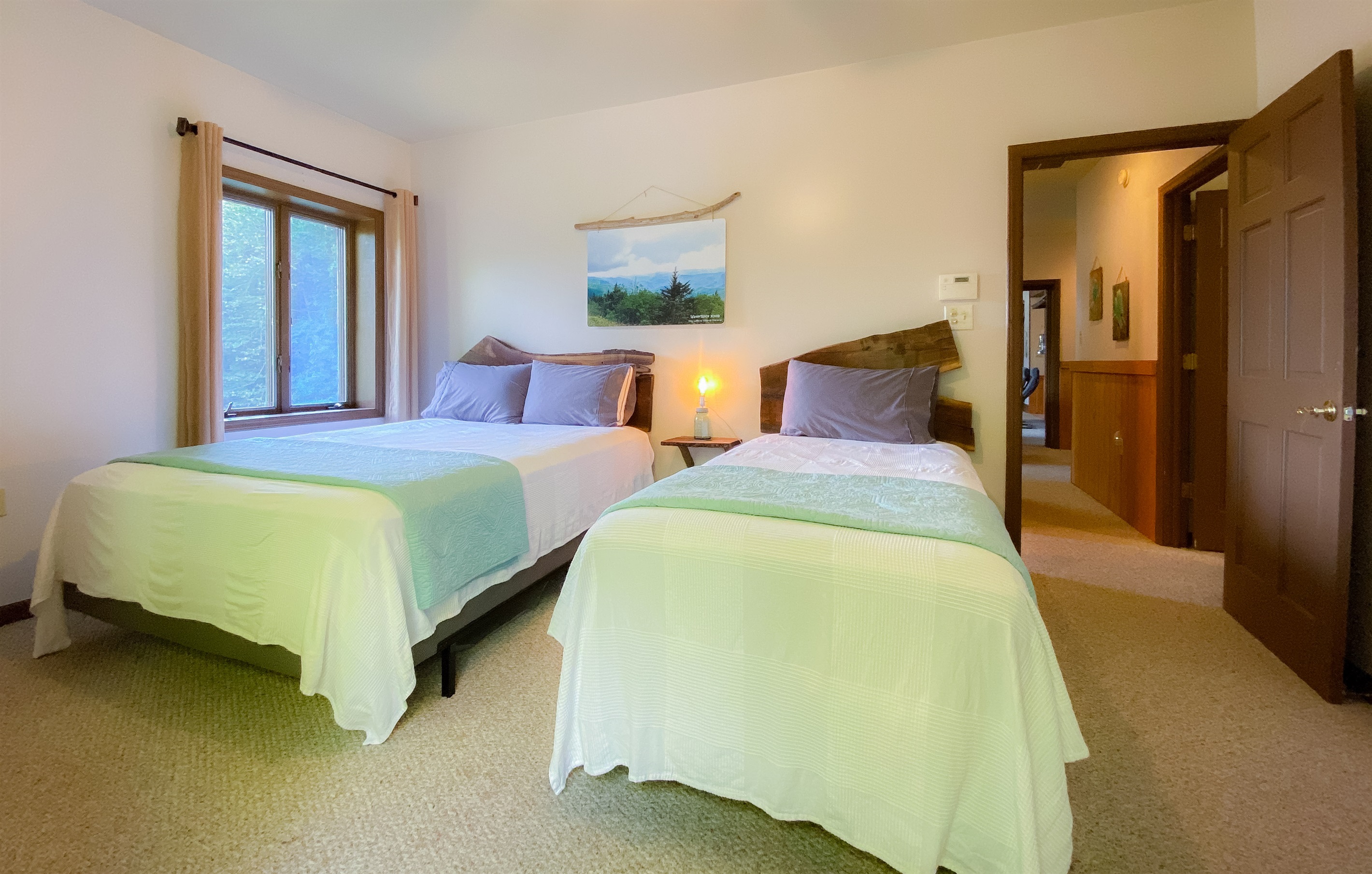 Our Waterrock Knob themed bedroom overlooking one of the highest peaks in the Smokies. You can visit for a most excellent sunrise or sunset experience!