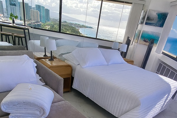 Wake up to sweeping ocean views and the golden light of Waikīkī mornings. This stylish studio offers a serene space with modern comfort, where every sunrise feels like a postcard from paradise.