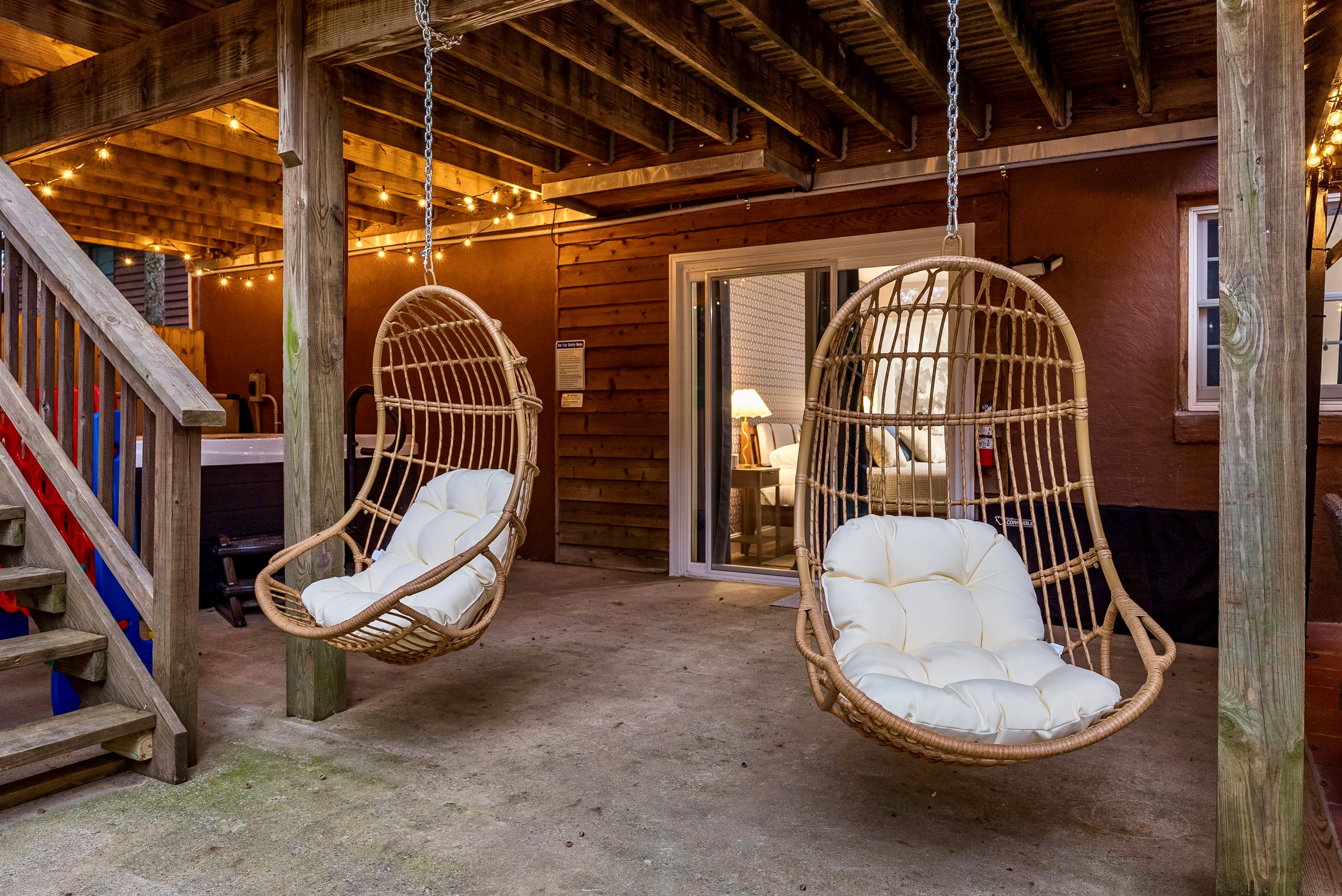 Curl up with a book, coffee, or glass of wine in these comfy basket swings—an inviting spot for conversation or quiet downtime.